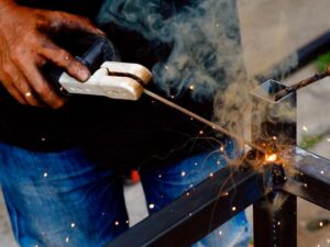 midsection-welder-working-construction-site_1048944-3258586